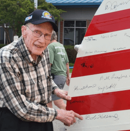 Bob Holland signing plane