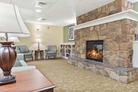 Living room with furniture and digital fireplace