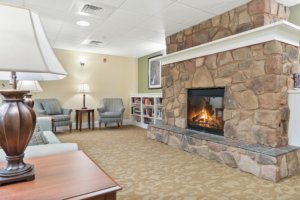 Living room with furniture and digital fireplace