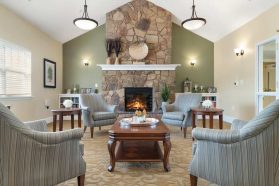 Living room with furniture and digital fireplace