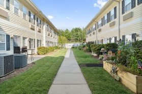 Beautiful mini garden behind the retirement apartment