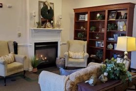 Comfortable retirement home living room with fireplace