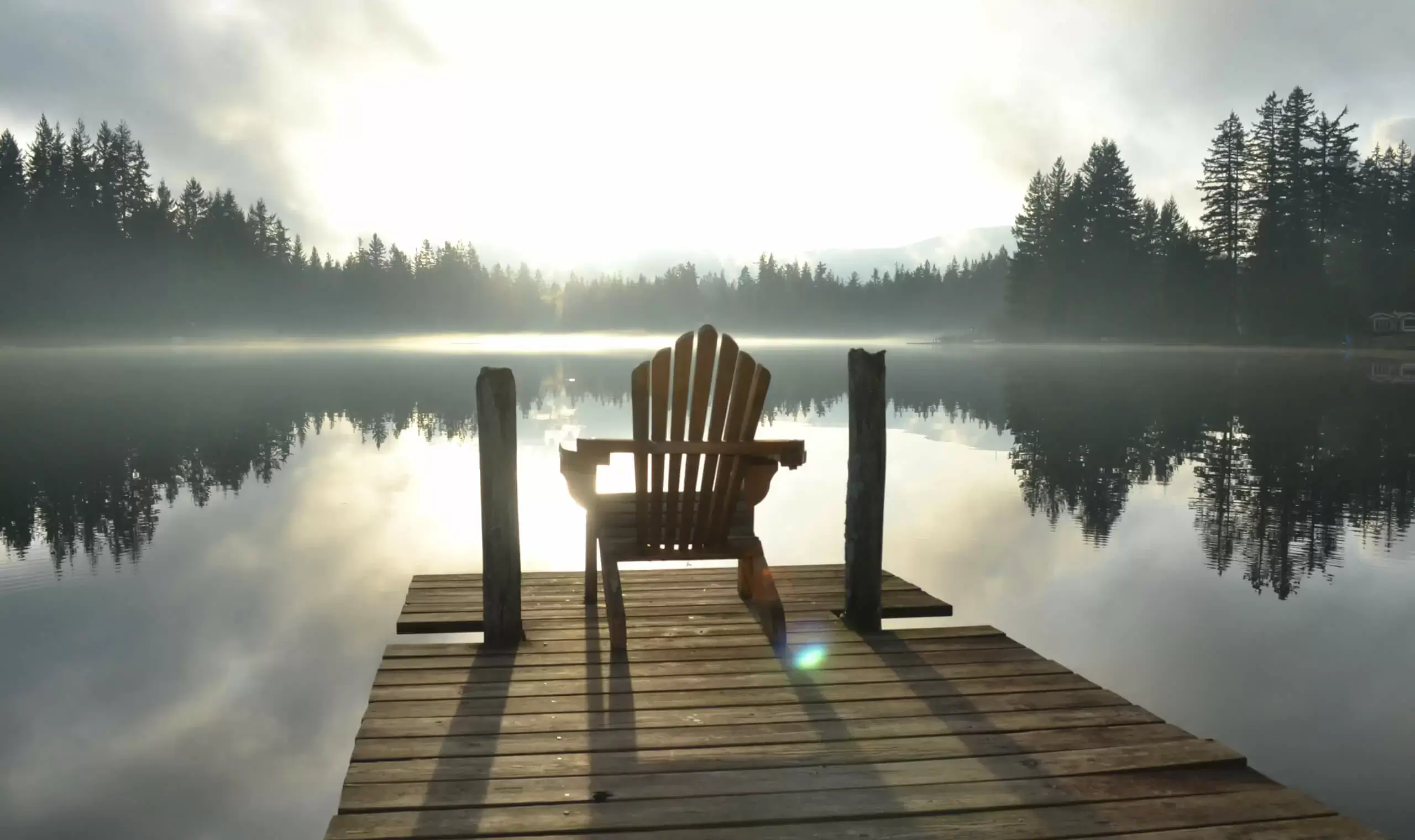 A chair by the beautiful lake