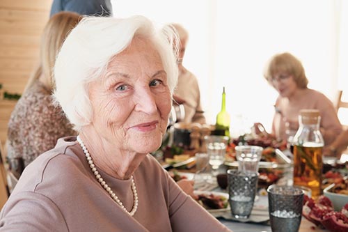 Old woman take a selfie at lunch