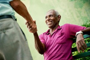 The old man grabbed his friend's hand