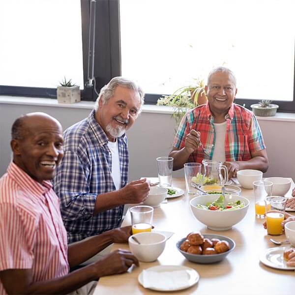 Senior citizens having lunch together