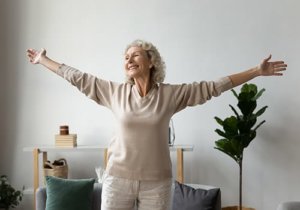 Old woman looks happy with her new room