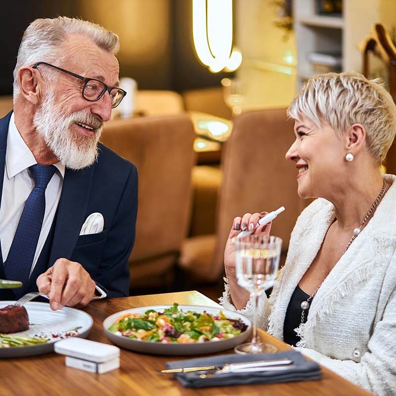 Senior couple having private dinner in a retirement community