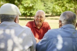 Old man talking to his friends