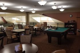 Dining space with billiard on senior living community