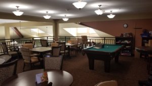 Dining space with billiard on senior living community